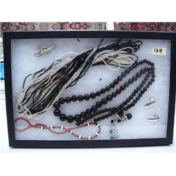 Display box of costume jewelry (74)