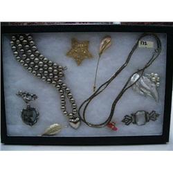 Display box of costume jewelry (74)