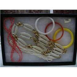 Display box of costume jewelry (74)