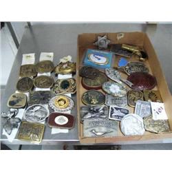 Collection of belt buckles: Alaska big game animals, ivory belt buckle with scrimshawed walrus, Stat