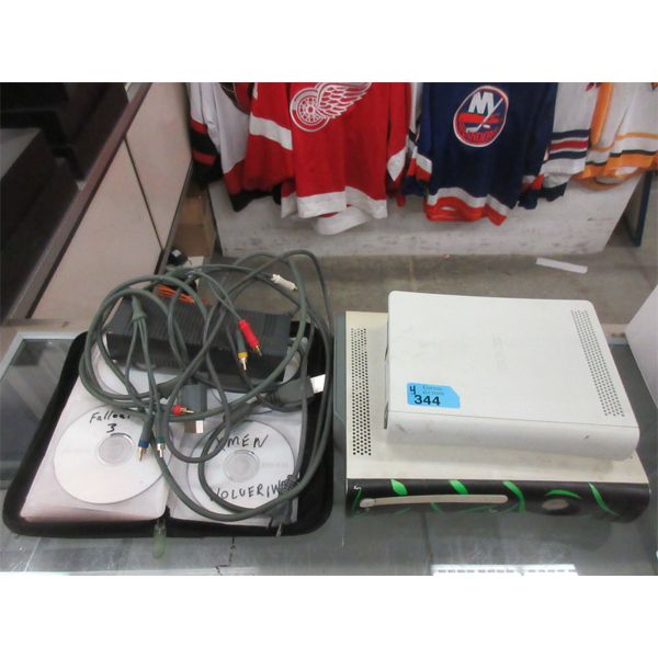 2 XBOX 360 Consoles with Binder of Games