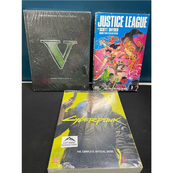 Lot of 3 Video Game Strategy Guides/Books; Grand Theft Auto V, Cyberpunk, & Justice League