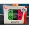 Image 1 : Lot of 1 Set of Joycons for Nintendo Switch with Handgrip - Green/Pink