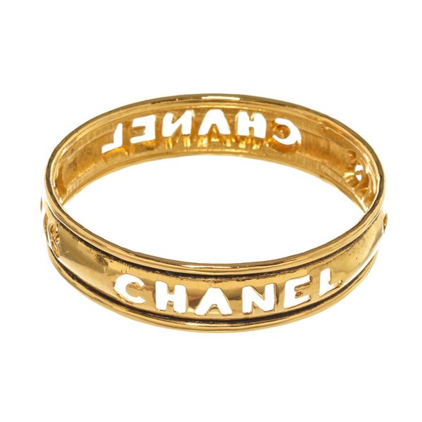 Chanel Gold Metal Cut Out Logo Bangle Bracelet