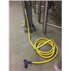 Image 1 : GROUP OF ASSORTED BREWERY TANK HOSES (RED) AND HEAVY DUTY SPRAY HOSES W/NOZZLES (YELLOW)