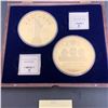 Image 1 : Queen Elizabeth and Statue of Liberty Gold coins