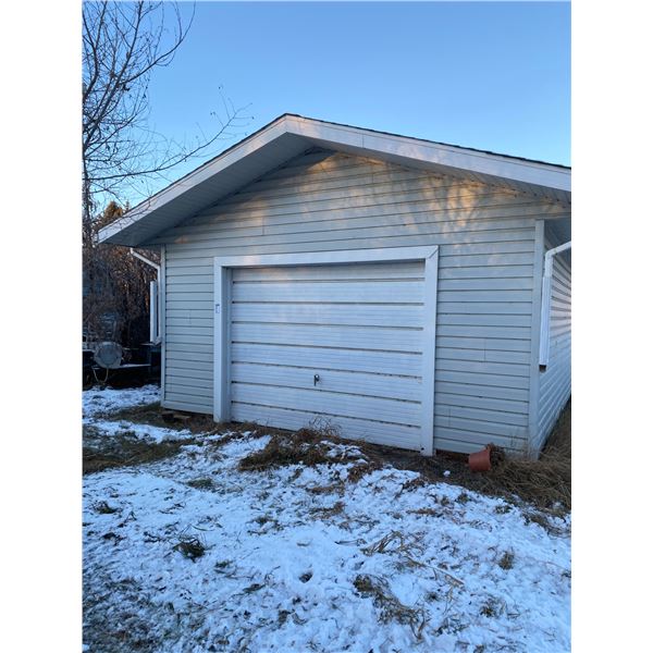 Approx. 16' x 31' Garage c/w wood floor on northside & dirt floor on southside (buyer responsible to