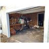 Image 6 : Approx. 16' x 31' Garage c/w wood floor on northside & dirt floor on southside (buyer responsible to