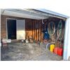 Image 7 : Approx. 16' x 31' Garage c/w wood floor on northside & dirt floor on southside (buyer responsible to