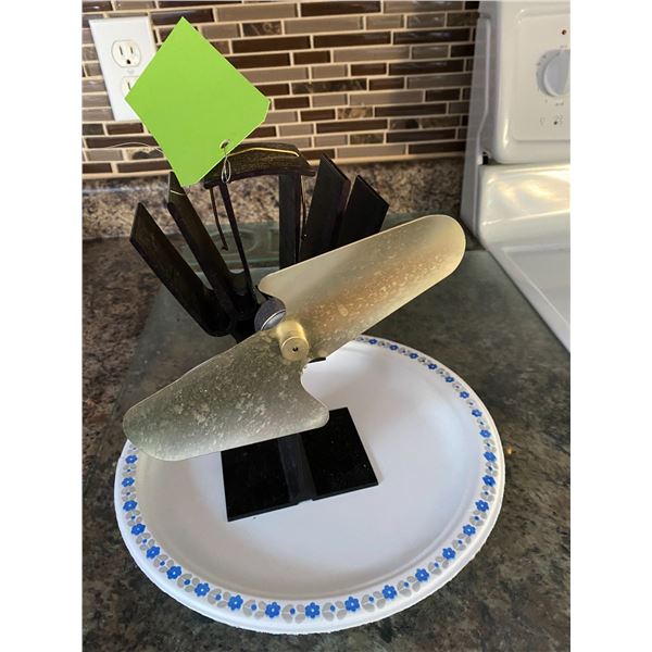 Wood stove heat powered fan