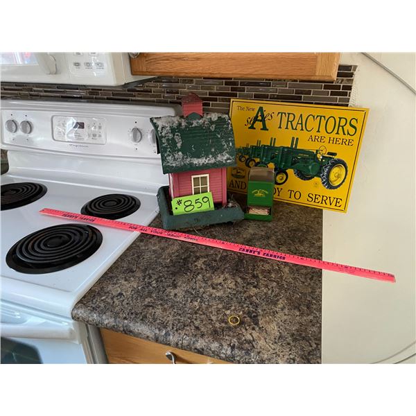 JD metal sign, JD match stick dispenser, Red barn bird feeder and a meter stick