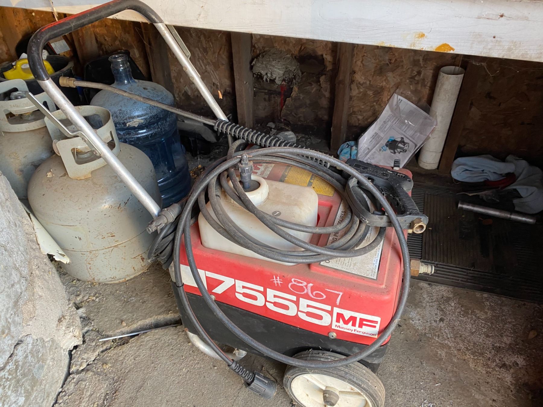 Balance of misc. in shed. MF pressure washer, propane bottles, shovels
