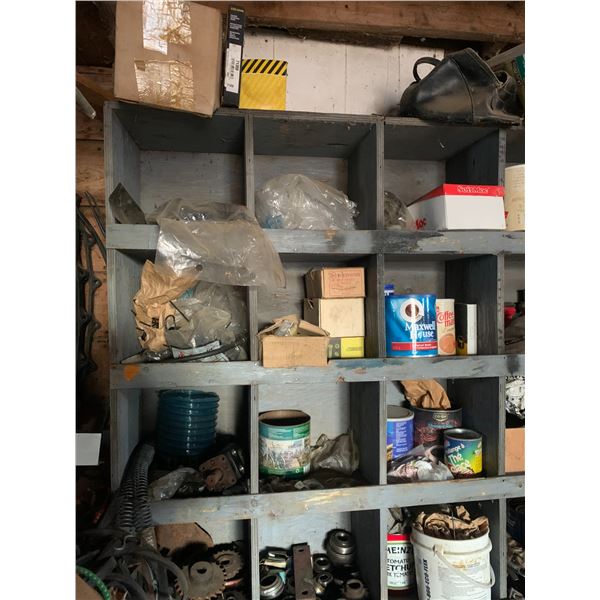 Contents of grey shelf unit c/w misc. in front, on the floor.(Grey shelf stays with barn)
