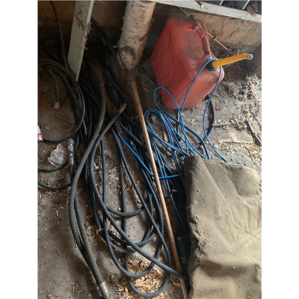 Heavy tarp, blue cord, hoses, jerry can & sprayer