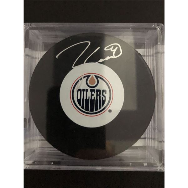 TAYLOR HALL SIGNED EDMONTON OILERS PUCK
