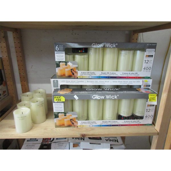 Shelf Lot Of Glow Wick Candles