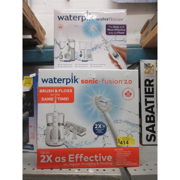 1 Waterpik Water Flosser & 2 Waterpik Twin Packs 