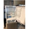 Image 2 : STAINLESS STEEL GE FRIDGE/FREEZER COMBO MODEL MDE19DSNKASS 29" X 29" X 66" DOOR DENTED, SCRATCHES