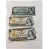 Image 1 : 3 Canada $1 bills