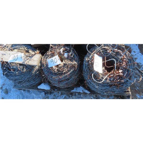three full rolls of barbed wire
