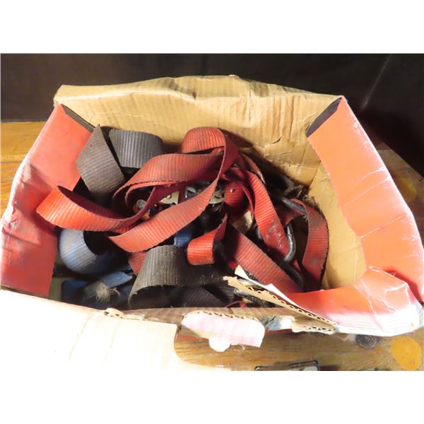 box of straps tiedowns and chevy bowties