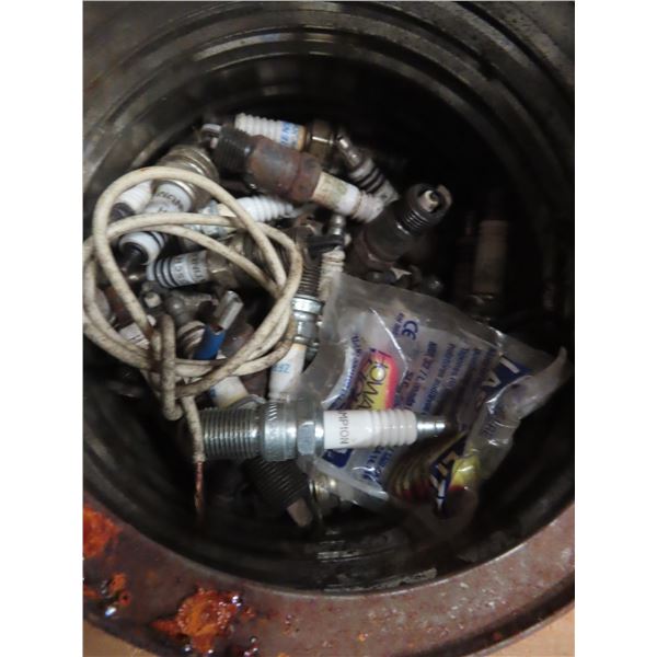 pail of old spark plugs , chain link , misc