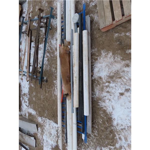 lot of pvc piping , misc sizes widths and pieces . Caps and angles in tote