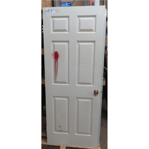 79   x 32  interior door one side has red paint splotch