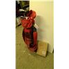 golf clubs in bag and 12 selfie sticks