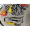 Image 4 : chalk line , vices , pry bars , tape measures , laser level
