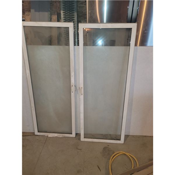 2 used windows 22 3/4" x 57 3/8"