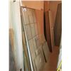 Image 10 : LARGE WALL RACK OF DOOR FRAME MATERIAL, SAW HORSES, BENCH WITH CONTENTS, ROOM OF ASSORTED GLASS