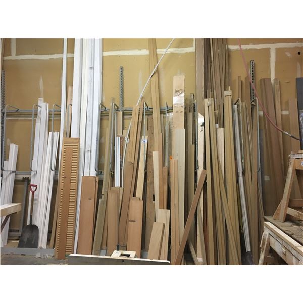 LARGE WALL RACK OF DOOR FRAME MATERIAL, SAW HORSES, BENCH WITH CONTENTS, ROOM OF ASSORTED GLASS