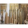 Image 1 : LARGE WALL RACK OF DOOR FRAME MATERIAL, SAW HORSES, BENCH WITH CONTENTS, ROOM OF ASSORTED GLASS