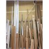 Image 2 : LARGE WALL RACK OF DOOR FRAME MATERIAL, SAW HORSES, BENCH WITH CONTENTS, ROOM OF ASSORTED GLASS