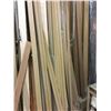 Image 5 : LARGE WALL RACK OF DOOR FRAME MATERIAL, SAW HORSES, BENCH WITH CONTENTS, ROOM OF ASSORTED GLASS