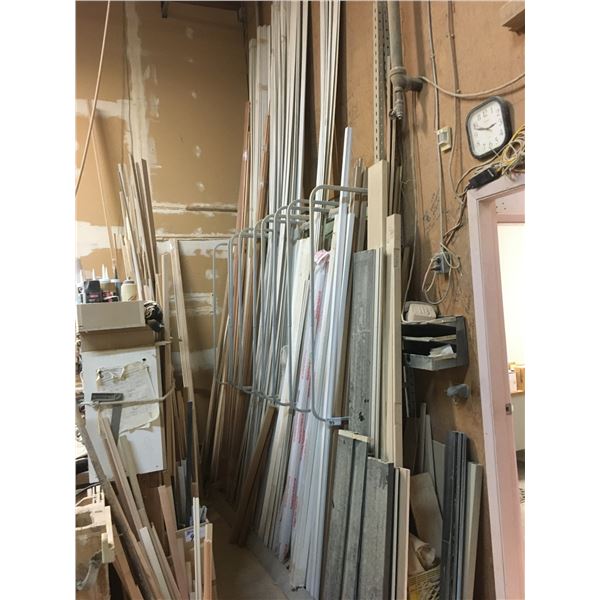 METAL LONG MATERIAL STORAGE RACK AND ALL THE ASSORTED WOOD TRIM LENGTHS