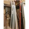 Image 1 : *LARGE GROUP OF ASSORTED WOOD AND METAL MATERIAL AND CABINETS UNDER STAIRS WITH CONTENTS