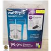 Image 1 : WATERPIK WITH ACCESSORIES AND BOX