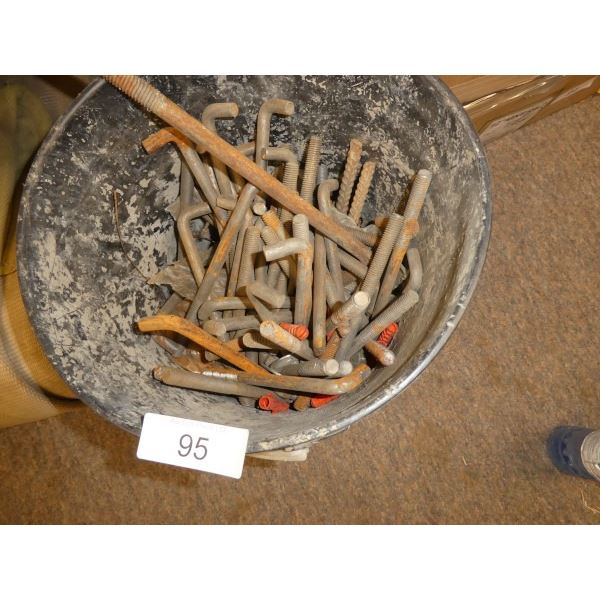 Bucket with assorted concrete anchors