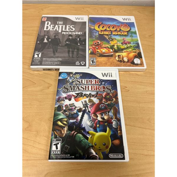 3 Nintendo Wii Games as pictured - Super Smash Bros (open) / Beatles & Cocoto (sealed)