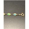 Image 2 : 14KT YELLOW GOLD NATURAL OPAL BRACELET, SET WITH 16 MIXED CUT FACETED NATURAL WHITE CRYSTAL OPALS