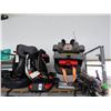 Image 1 : Child Car Seats, Tire Pump, Tripods, Canes On Shelf