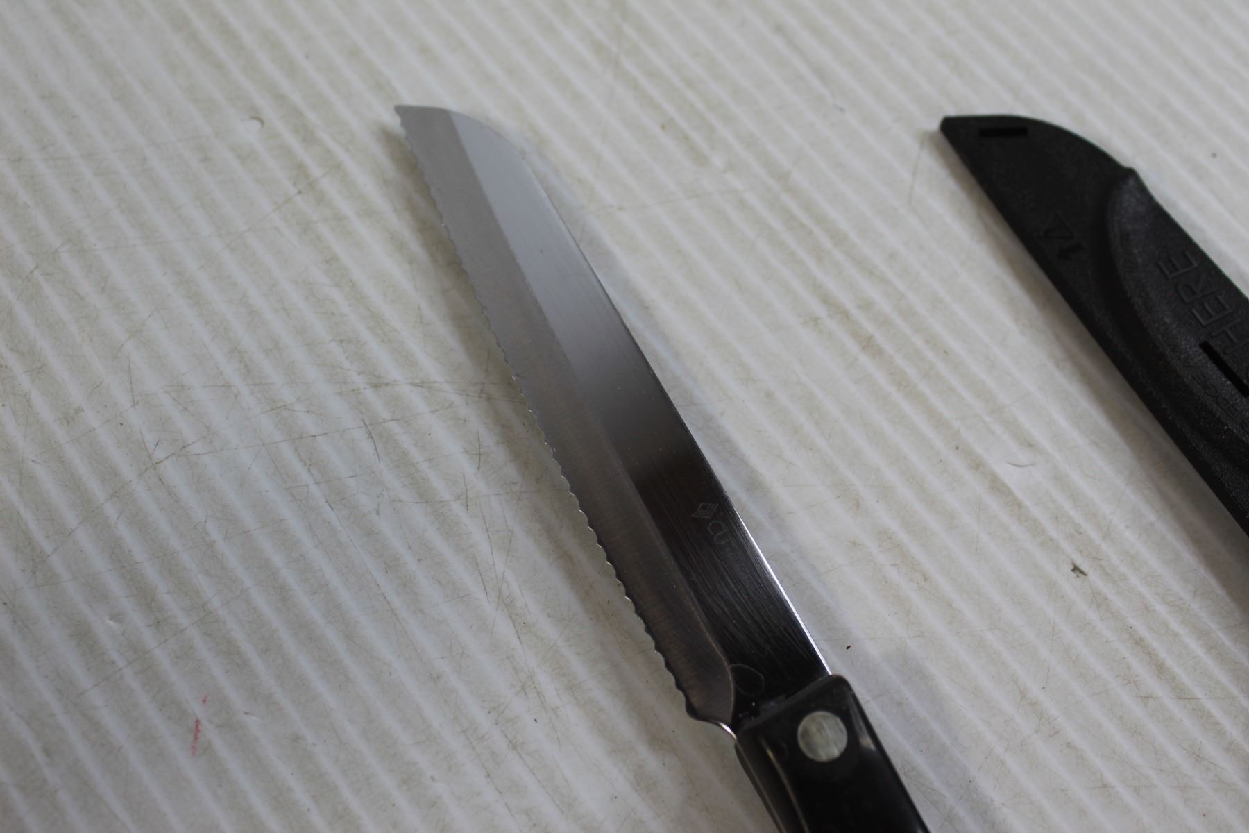 Cutco Serrated Knife and Sheath Bodnarus Auctioneering