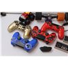 Image 2 : (4) PS4 Controllers, (2) Nintendo Controllers, PC Mouse, Skateboard Trucks, Liquor Gun, Tonka Monste