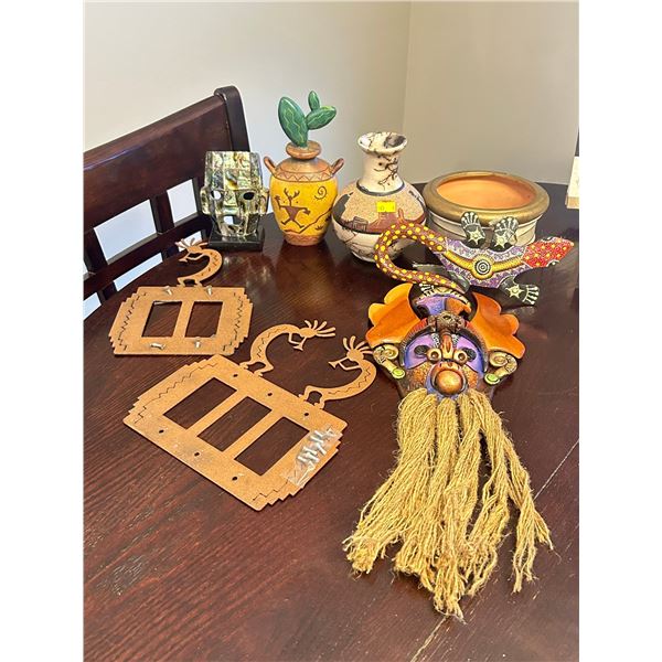 Assorted Collection of Home Decor Includes Urns, Face Mask, Kokopelli Light Switch Plates & More