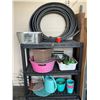 Image 1 : Utility Shelf With Assorted Collection Of Outdoor Home Items - Sprinkler, Hand Tools, Edging & More