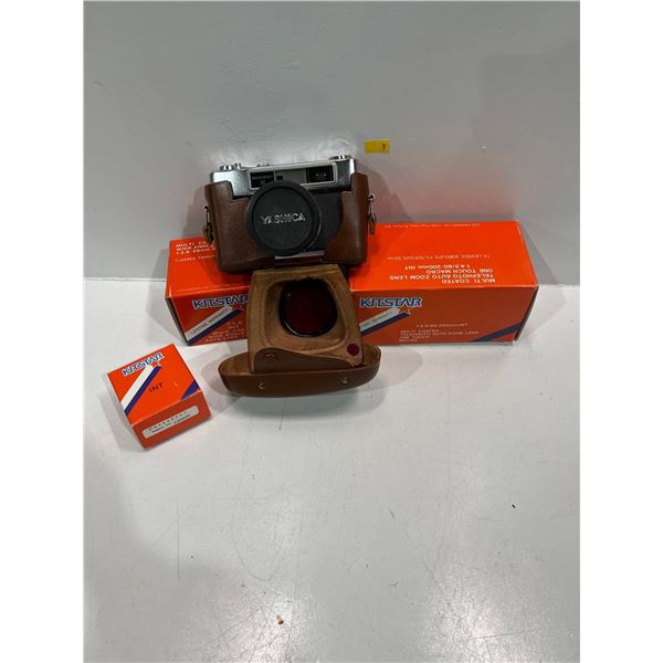 Vintage Yashica Camera with Leather Case and Extra Lens