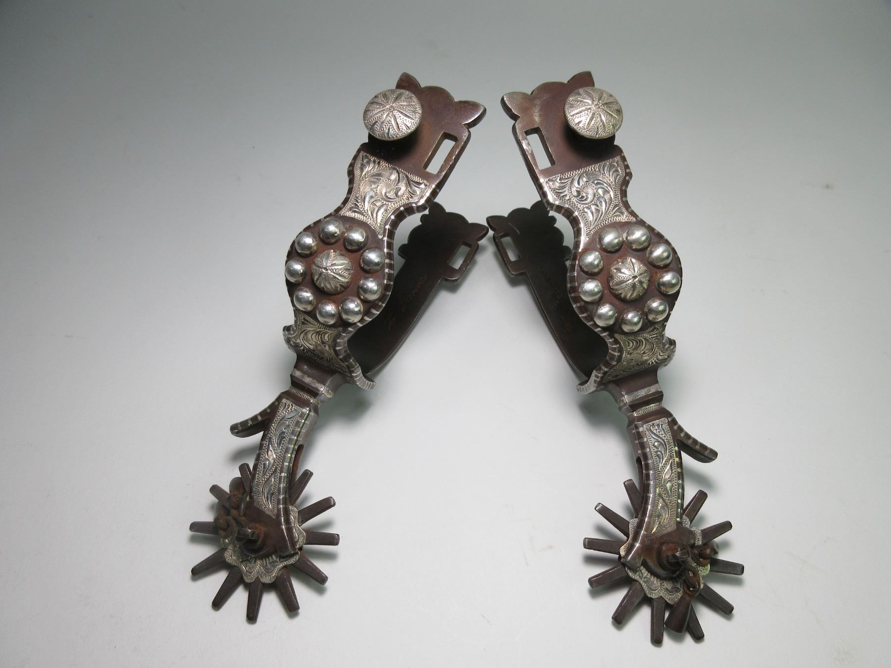 Marked E Garcia In Script Silver Inlaid Spurs- 1.5
