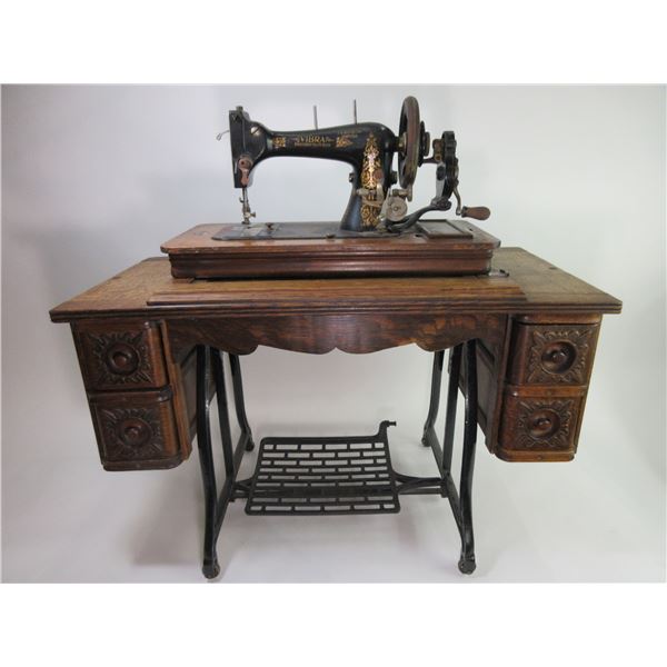 4 Drawer Oak Vibra Treadle Sewing Machine- 21"H X 32"W X 16"D- Good Condition